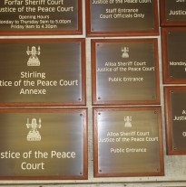 Aged Bronze Signs on mahogany bases