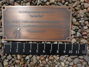 Reverse engraved unfilled bronze memorial plaque