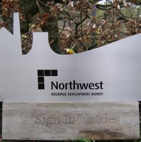 Shaped stainless steel sign