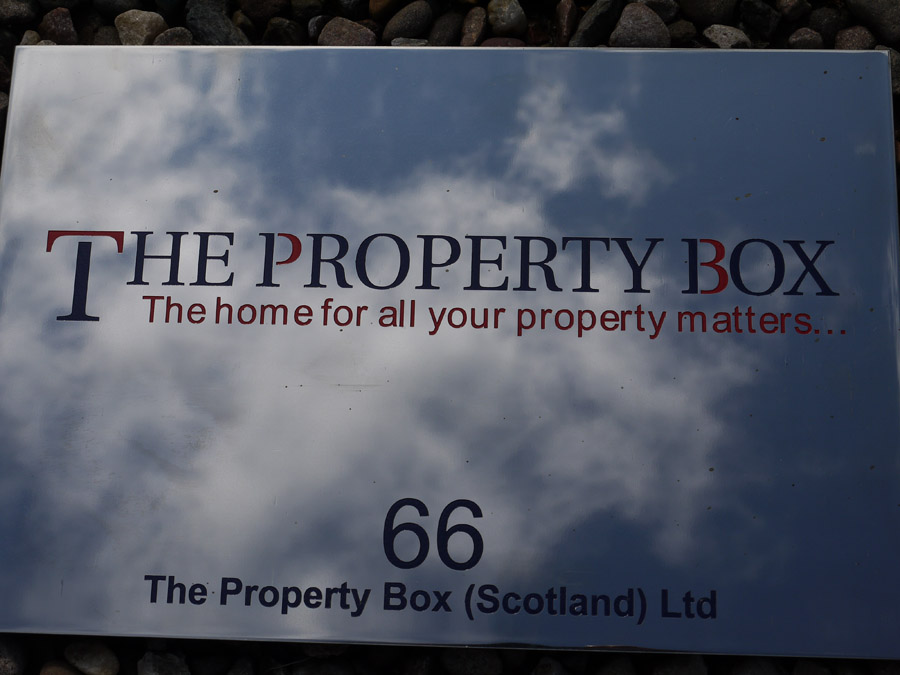 Bright polished stainless steel reflecting the sky