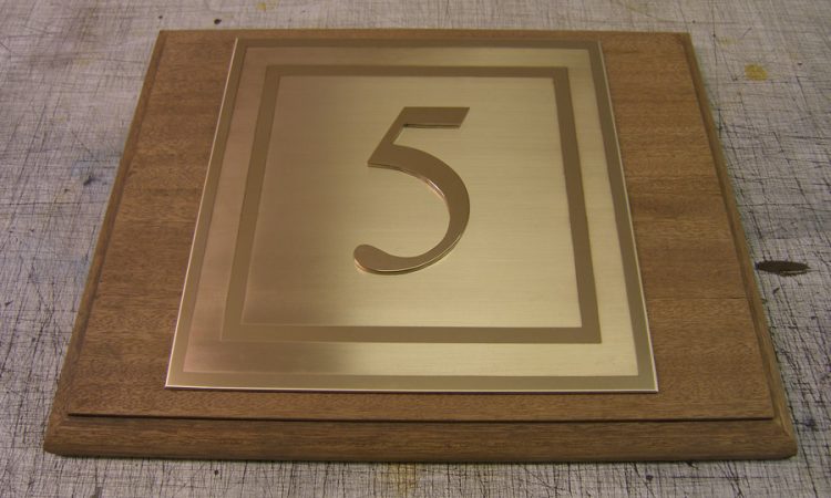 Hotel Number, cut out number on brushed and engraved Brass